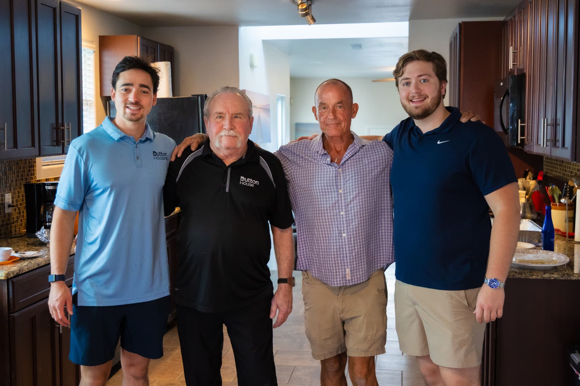 The Dutton House team in the kitchen: Clay, Tim, Michael, and Griffin